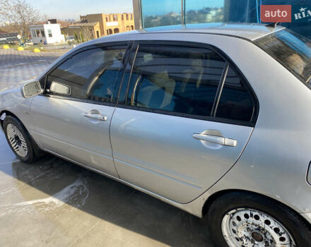 Сірий Міцубісі Lancer, об'ємом двигуна 1.3 л та пробігом 376 тис. км за 3700 $, фото 6 на Automoto.ua