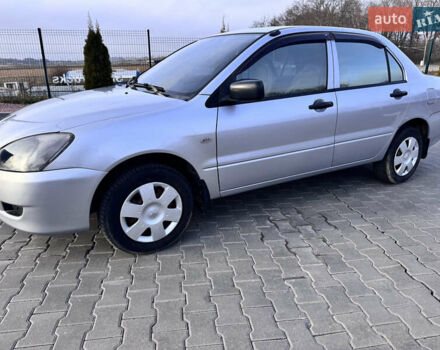 Сірий Міцубісі Lancer, об'ємом двигуна 1.3 л та пробігом 450 тис. км за 2850 $, фото 7 на Automoto.ua