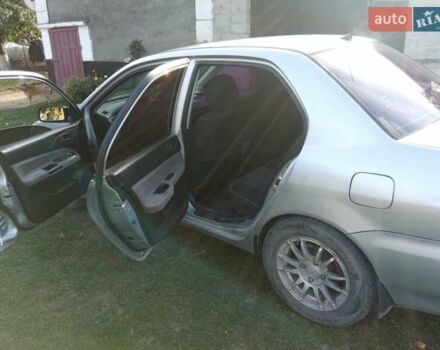 Серый Мицубиси Лансер, объемом двигателя 1.6 л и пробегом 244 тыс. км за 4000 $, фото 3 на Automoto.ua