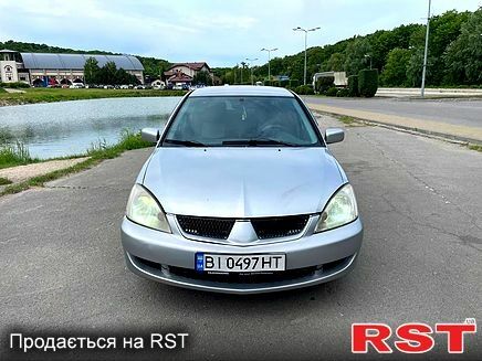 Серый Мицубиси Лансер, объемом двигателя 1.6 л и пробегом 260 тыс. км за 2900 $, фото 1 на Automoto.ua