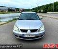 Серый Мицубиси Лансер, объемом двигателя 1.6 л и пробегом 260 тыс. км за 2900 $, фото 1 на Automoto.ua