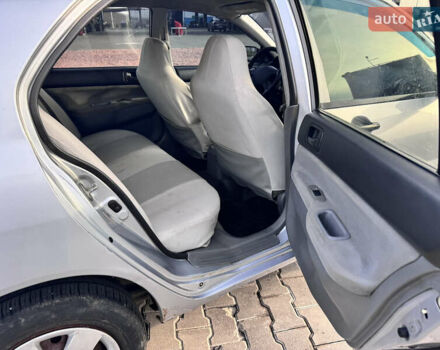 Сірий Міцубісі Lancer, об'ємом двигуна 1.3 л та пробігом 450 тис. км за 2650 $, фото 16 на Automoto.ua