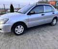 Сірий Міцубісі Lancer, об'ємом двигуна 1.3 л та пробігом 450 тис. км за 2650 $, фото 2 на Automoto.ua