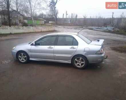 Серый Мицубиси Лансер, объемом двигателя 2 л и пробегом 300 тыс. км за 2850 $, фото 13 на Automoto.ua