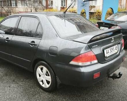Сірий Міцубісі Lancer, об'ємом двигуна 1.58 л та пробігом 110 тис. км за 2999 $, фото 10 на Automoto.ua