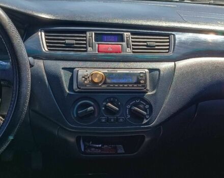 Сірий Міцубісі Lancer, об'ємом двигуна 1.6 л та пробігом 284 тис. км за 4330 $, фото 16 на Automoto.ua