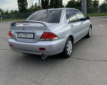 Сірий Міцубісі Lancer, об'ємом двигуна 1.6 л та пробігом 285 тис. км за 4450 $, фото 4 на Automoto.ua
