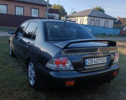 Мицубиси Лансер 2004 в Нежине на Automoto.ua Серый Мицубиси Лансер, объемом двигателя 2 л и пробегом 280 тыс. км за 6000 $, фото 5 на Automoto.ua