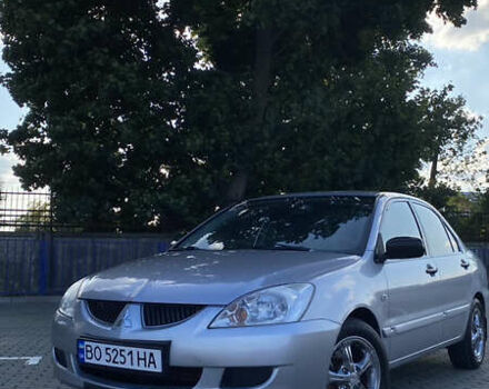 Сірий Міцубісі Lancer, об'ємом двигуна 1.58 л та пробігом 270 тис. км за 1999 $, фото 2 на Automoto.ua