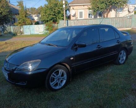 Мицубиси Лансер 2004 в Нежине на Automoto.ua Серый Мицубиси Лансер, объемом двигателя 2 л и пробегом 280 тыс. км за 6000 $, фото 8 на Automoto.ua