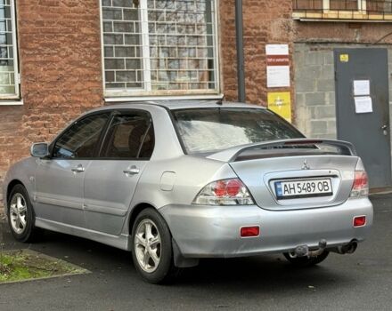 Серый Мицубиси Лансер, объемом двигателя 2 л и пробегом 180 тыс. км за 3700 $, фото 6 на Automoto.ua