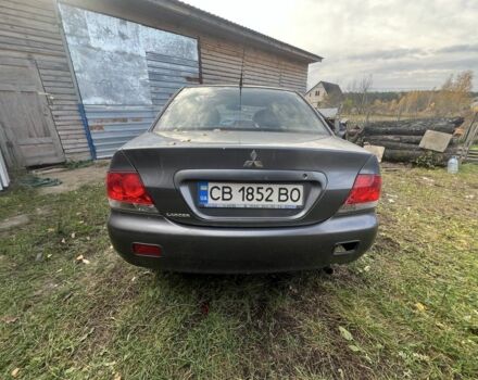 Серый Мицубиси Лансер, объемом двигателя 1.6 л и пробегом 200 тыс. км за 2400 $, фото 4 на Automoto.ua