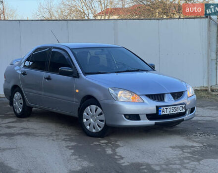 Серый Мицубиси Лансер, объемом двигателя 1.6 л и пробегом 320 тыс. км за 3650 $, фото 2 на Automoto.ua