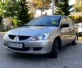 Сірий Міцубісі Lancer, об'ємом двигуна 1.3 л та пробігом 65 тис. км за 6550 $, фото 2 на Automoto.ua