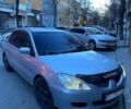 Сірий Міцубісі Lancer, об'ємом двигуна 1.6 л та пробігом 380 тис. км за 4600 $, фото 1 на Automoto.ua