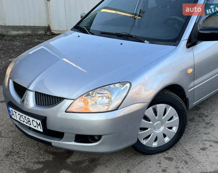 Серый Мицубиси Лансер, объемом двигателя 1.6 л и пробегом 320 тыс. км за 3650 $, фото 15 на Automoto.ua