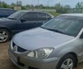Сірий Міцубісі Lancer, об'ємом двигуна 1.58 л та пробігом 160 тис. км за 3500 $, фото 1 на Automoto.ua