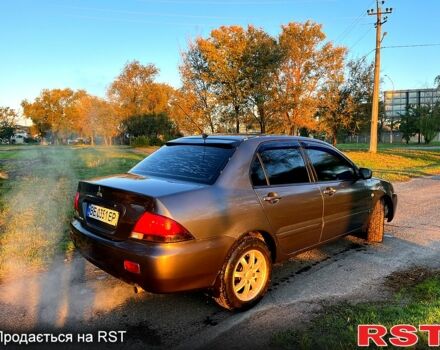 Серый Мицубиси Лансер, объемом двигателя 1.6 л и пробегом 275 тыс. км за 3000 $, фото 4 на Automoto.ua