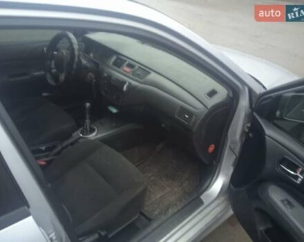 Серый Мицубиси Лансер, объемом двигателя 2 л и пробегом 300 тыс. км за 2850 $, фото 9 на Automoto.ua