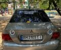 Серый Мицубиси Лансер, объемом двигателя 1.3 л и пробегом 255 тыс. км за 2900 $, фото 1 на Automoto.ua