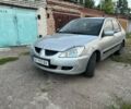 Сірий Міцубісі Lancer, об'ємом двигуна 1.6 л та пробігом 485 тис. км за 2000 $, фото 1 на Automoto.ua