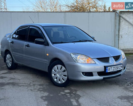 Серый Мицубиси Лансер, объемом двигателя 1.6 л и пробегом 320 тыс. км за 3650 $, фото 6 на Automoto.ua