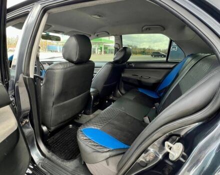 Серый Мицубиси Лансер, объемом двигателя 1.6 л и пробегом 490 тыс. км за 1799 $, фото 12 на Automoto.ua