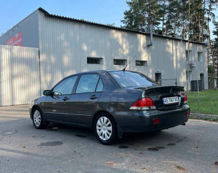 Сірий Міцубісі Lancer, об'ємом двигуна 1.6 л та пробігом 320 тис. км за 5000 $, фото 4 на Automoto.ua