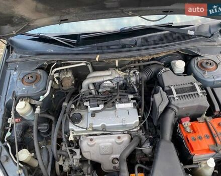 Сірий Міцубісі Lancer, об'ємом двигуна 1.58 л та пробігом 307 тис. км за 3800 $, фото 6 на Automoto.ua