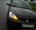 Сірий Міцубісі Lancer, об'ємом двигуна 1.6 л та пробігом 257 тис. км за 3100 $, фото 1 на Automoto.ua
