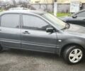 Сірий Міцубісі Lancer, об'ємом двигуна 1.58 л та пробігом 110 тис. км за 2999 $, фото 5 на Automoto.ua