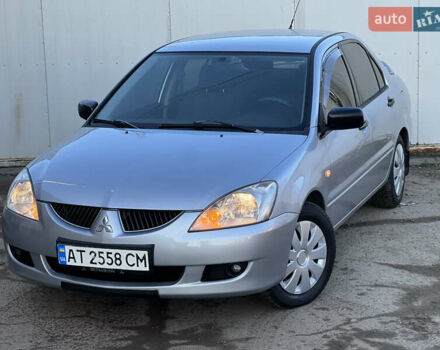 Серый Мицубиси Лансер, объемом двигателя 1.6 л и пробегом 320 тыс. км за 3650 $, фото 13 на Automoto.ua