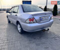 Сірий Міцубісі Lancer, об'ємом двигуна 1.3 л та пробігом 450 тис. км за 2850 $, фото 3 на Automoto.ua
