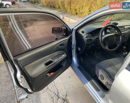 Сірий Міцубісі Lancer, об'ємом двигуна 1.3 л та пробігом 376 тис. км за 3700 $, фото 12 на Automoto.ua