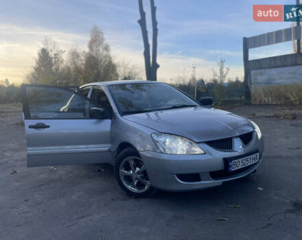 Сірий Міцубісі Lancer, об'ємом двигуна 1.58 л та пробігом 271 тис. км за 3000 $, фото 10 на Automoto.ua