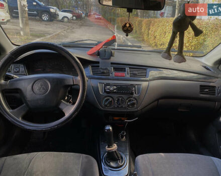Сірий Міцубісі Lancer, об'ємом двигуна 1.3 л та пробігом 376 тис. км за 3700 $, фото 7 на Automoto.ua