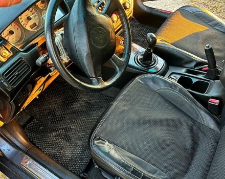 Серый Мицубиси Лансер, объемом двигателя 1.6 л и пробегом 275 тыс. км за 3000 $, фото 6 на Automoto.ua