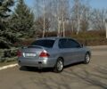 Серый Мицубиси Лансер, объемом двигателя 1.58 л и пробегом 164 тыс. км за 4600 $, фото 1 на Automoto.ua