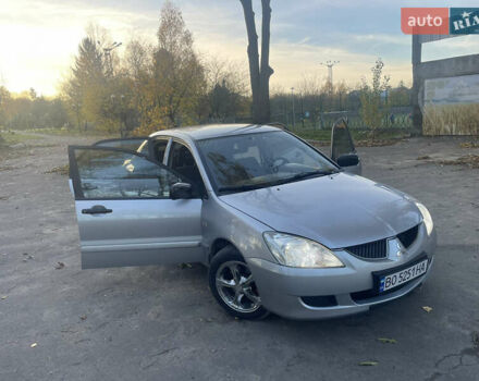Сірий Міцубісі Lancer, об'ємом двигуна 1.58 л та пробігом 271 тис. км за 3000 $, фото 11 на Automoto.ua