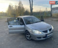 Сірий Міцубісі Lancer, об'ємом двигуна 1.58 л та пробігом 271 тис. км за 3000 $, фото 11 на Automoto.ua