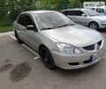 Сірий Міцубісі Lancer, об'ємом двигуна 1.6 л та пробігом 265 тис. км за 5200 $, фото 2 на Automoto.ua