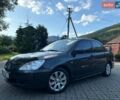 Серый Мицубиси Лансер, объемом двигателя 1.58 л и пробегом 231 тыс. км за 3600 $, фото 1 на Automoto.ua