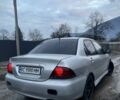 Серый Мицубиси Лансер, объемом двигателя 1.6 л и пробегом 315 тыс. км за 2950 $, фото 2 на Automoto.ua