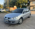 Сірий Міцубісі Lancer, об'ємом двигуна 1.58 л та пробігом 220 тис. км за 4400 $, фото 1 на Automoto.ua