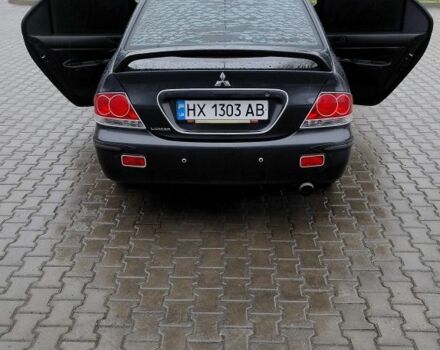 Сірий Міцубісі Lancer, об'ємом двигуна 1.6 л та пробігом 177 тис. км за 4500 $, фото 23 на Automoto.ua