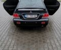 Сірий Міцубісі Lancer, об'ємом двигуна 1.6 л та пробігом 177 тис. км за 4500 $, фото 23 на Automoto.ua
