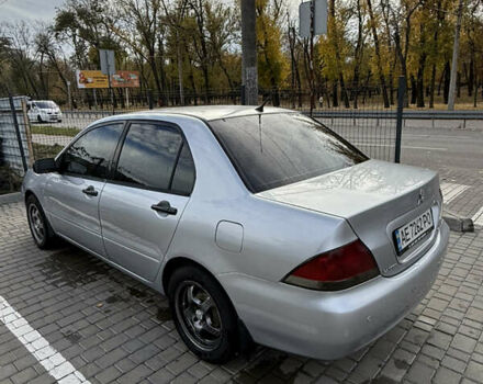 Серый Мицубиси Лансер, объемом двигателя 1.29 л и пробегом 263 тыс. км за 3400 $, фото 4 на Automoto.ua