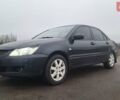 Сірий Міцубісі Lancer, об'ємом двигуна 1.58 л та пробігом 320 тис. км за 3800 $, фото 1 на Automoto.ua