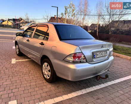 Серый Мицубиси Лансер, объемом двигателя 1.3 л и пробегом 450 тыс. км за 2800 $, фото 5 на Automoto.ua