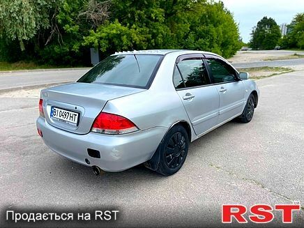 Серый Мицубиси Лансер, объемом двигателя 1.6 л и пробегом 260 тыс. км за 2900 $, фото 2 на Automoto.ua